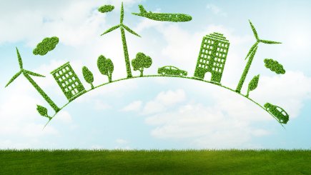 green grass with green windmills, car, buildings,