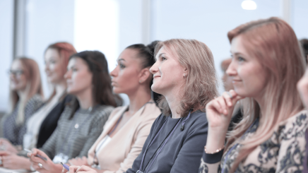 Women listening to panel discussion