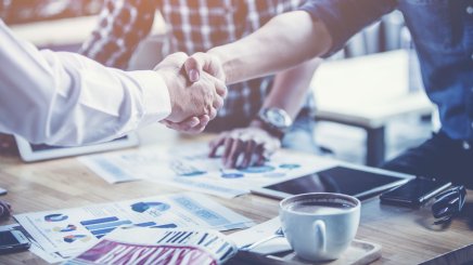 People negotiating in a business meeting