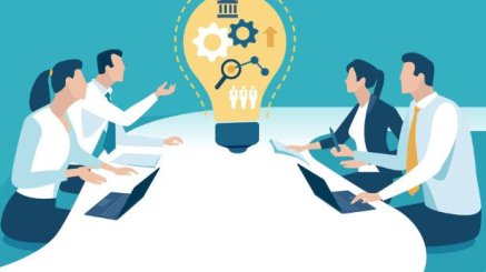 People working on ideas around a table