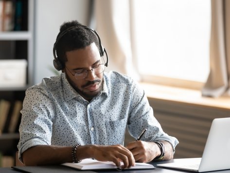 man working from home online