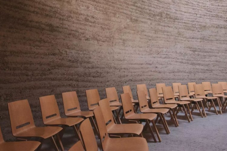 brown seminar chairs in a large room
