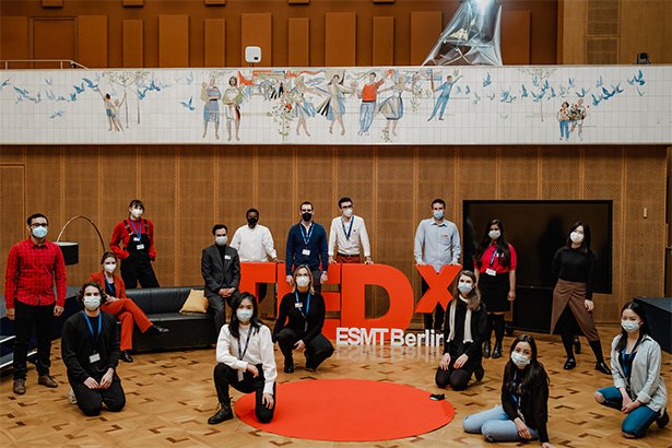 ESMT students wearing masks at TEDx event. 