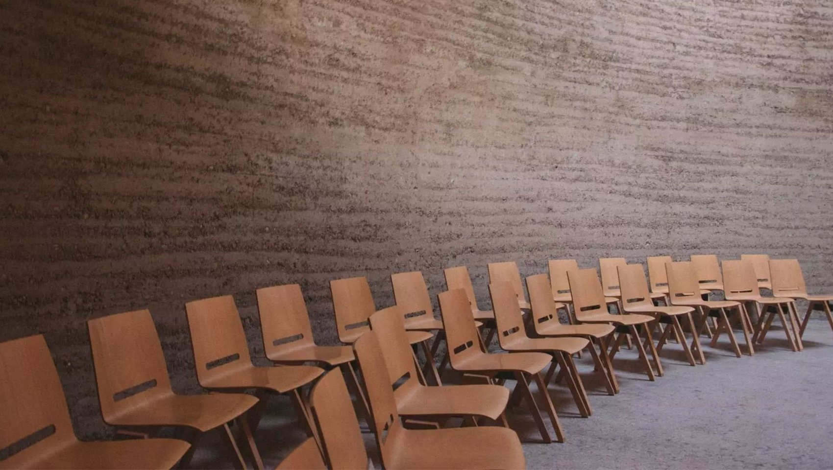 brown seminar chairs in a large room